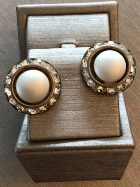 Vintage 1950’s white button clip on earrings surrounded by rhinestones